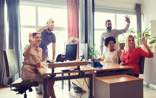 A team celebrating a successful project completion in an office. They are gathered around a table, laughing and high-fiving each other. Papers and laptops are scattered on the table, indicating a recent work session.