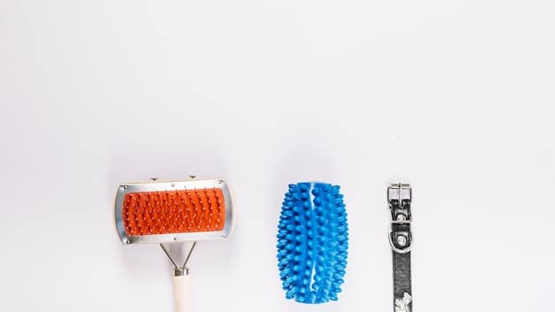 A close-up of a variety of pet grooming brushes. Each brush has a different design and bristle type, neatly arranged on a clean white surface.