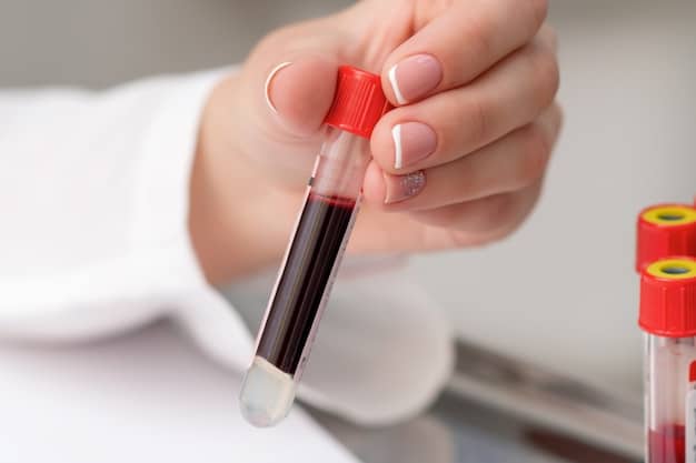 A blood sample being tested in a laboratory. The sample is labeled 